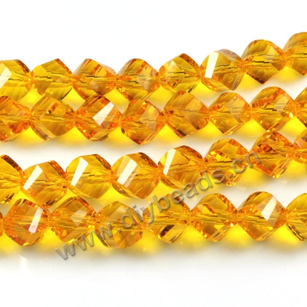 Bead, glass, gold, 8mm faceted twist round, sold per pkg 5 strands-72pcs/strand.