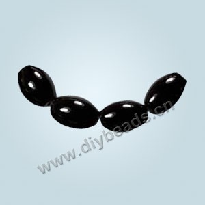 Bead, black agate (dyed),8x12mm oval. Sold per 16-inch strand.