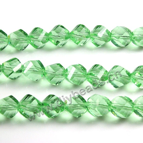 bead, glass, light green, 10mm faceted twist round, sold per pkg 5 strands.