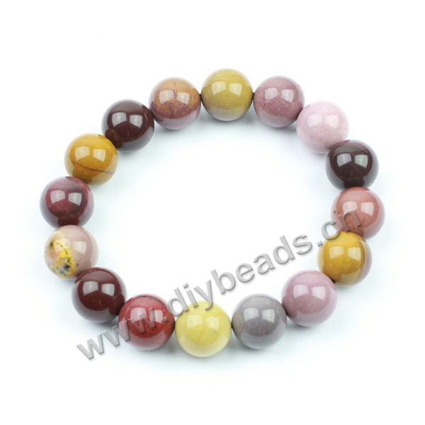 Bracelet, stretch, jasper, multicolor, 10mm faceted round beads, approx 19cm long. Sold per pkg of 5ps.