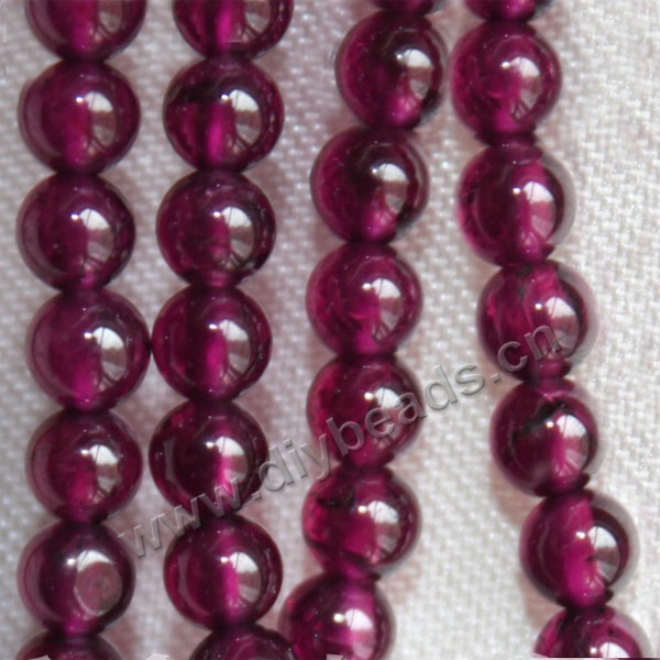 Bead, garnet (natural),rose red, 4mm round, AA grade, Mohs hardness 7 to 7-1/2. Sold per 16-inch strand