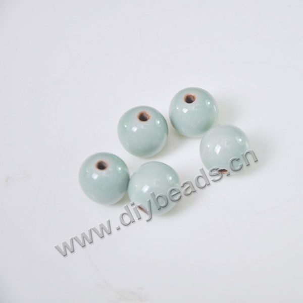 Bead , fancy glaze porcelain,cyan, 8mm round. Sold per pkg of 50 beads. 