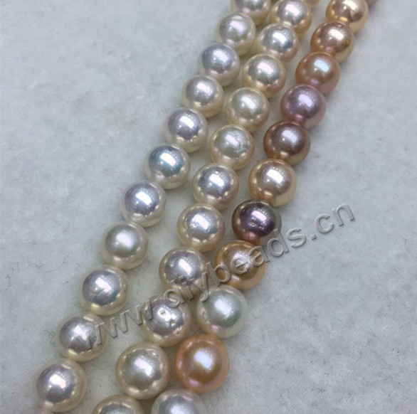Pearl, cultured freshwater Edison pearl AAA quality , 11-12mm  round. Sold per 16-inch(40cm) 1  strand