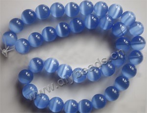 Bead, cat's eye glass,light blue, 10mm round, quality grade. Sold  (10) 14.5-inch strands.