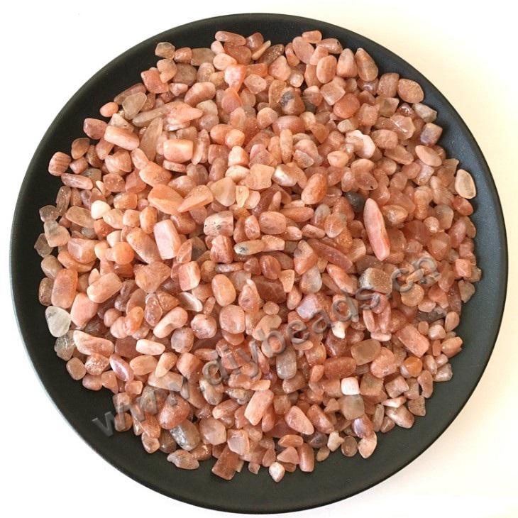 Bead Chips, natural sunstone chips without hole, 8-12mm. Sold per pkg of 5kgs