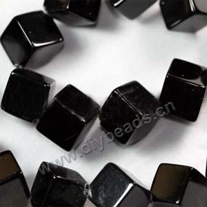 Bead, black agate (dyed), 10x10mm dice. Sold per 16-inch strand.