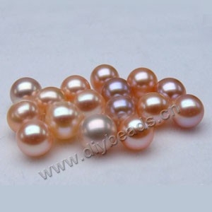 Pearl, cultured freshwater ,peach/mauve,8.5-9mm half-drilled round, AAA grade. Sold per pkg of 4pairs