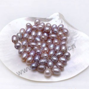 Pearl, cultured freshwater , mauve, 7-8mm half-drilled rice, AAA grade. Sold per pkg of 4pairs
