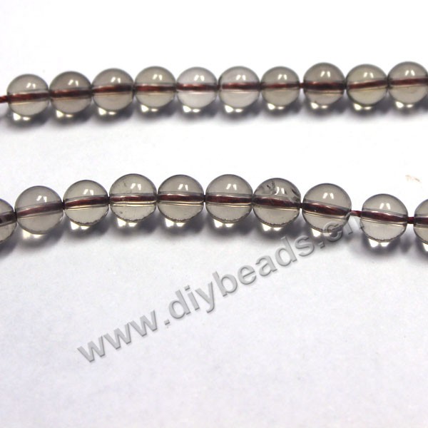 Bead, smoky quartz (heated/irradiated), 7mm round. Sold per 15.5-inch strand