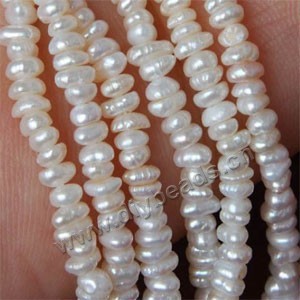 Pearl, cultured freshwater (bleached), white, 4-5mm medium-drilled oval, B grade, Mohs hardness 2-1/2 to 4. Sold per pkg of (10) 16-inch strands.