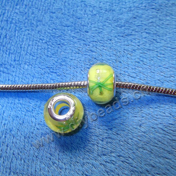 beads,glass,large hole beads yellow, 10x14mm. Sold per pkg of 100ps