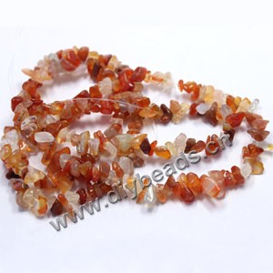 Bead, red agate (heated), medium chip . Sold per 35-inch strand.