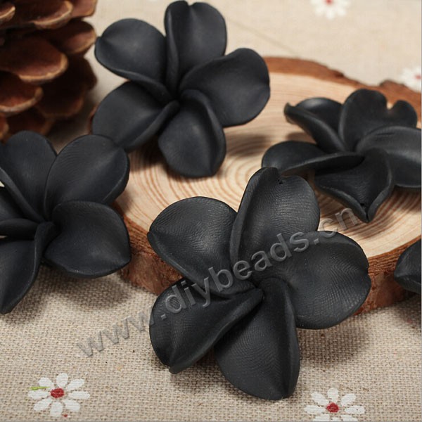 Bead, polymer clay,black,40x16mm flower. Sold per pkg of 50.
