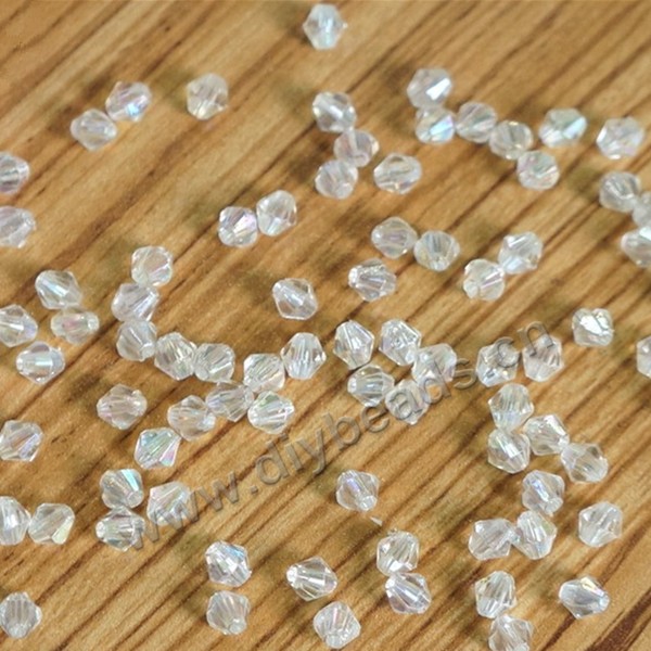 Faceted bead, acrylic, AB color, 4mm bicone beads. Sold per pkg of 500-gram
