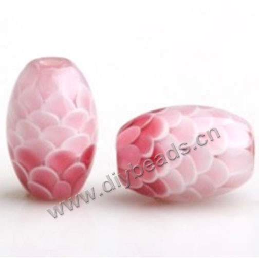 Bead,lampworked glass,red with pink, 15*10mm oval with fish scale design. Sold per pkg of 5.
