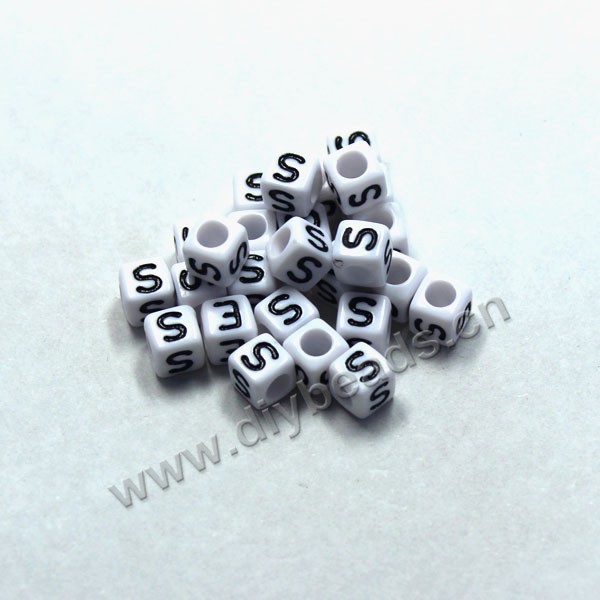 Bead, acrylic,White,alphabet is S, 6x6mm cube with 3.5mm drill hole. Sold per pkg of 100ps