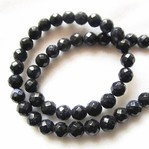 Bead, blue goldstone (manmade), 10mm 64-faceted round. Sold per 16-inch strand