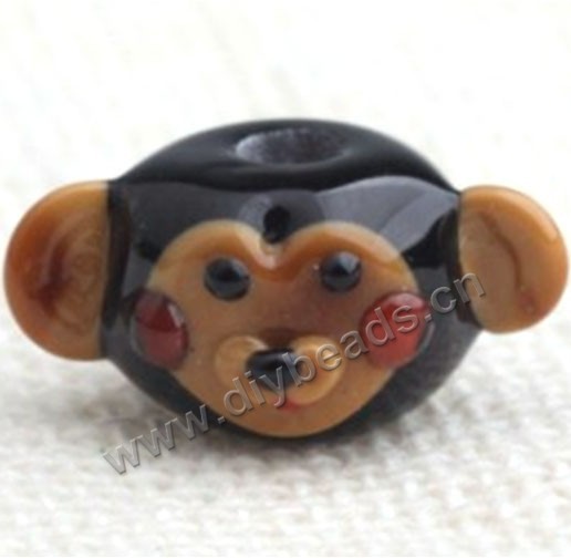 Bead,lampworked glass,black monkey head, 23*11mm rondelle with monkey. Sold per pkg of 5.