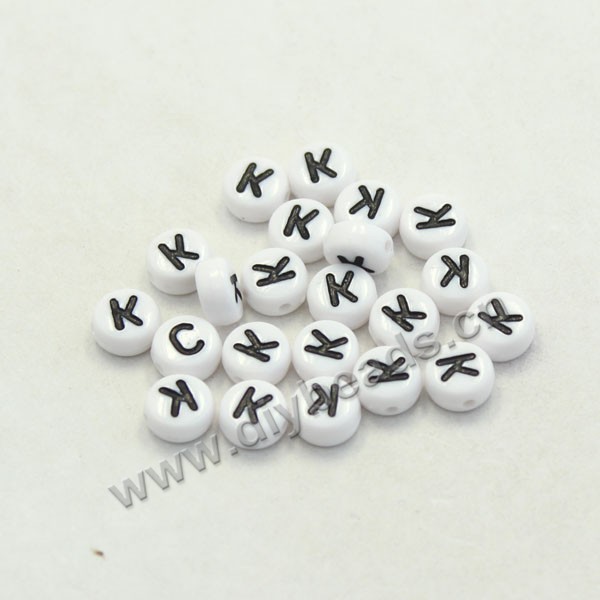 Bead mix, acrylic, white with black alphabet K, 7x4mm double-sided flat round with 1.2mm drill hole. Sold per pkg of 100ps