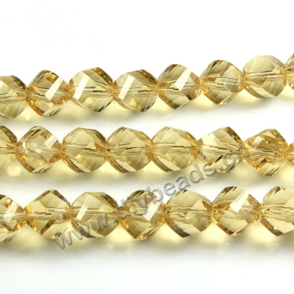 Bead, glass, gold champagne, 10mm faceted twist round, sold per pkg 5 strands.