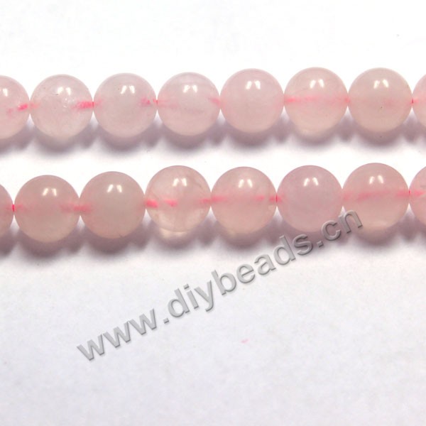Bead, rose quartz (natural), 10mm round, Sold per 16-inch strand