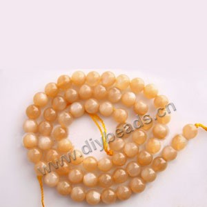 Bead, sunstone (natural), 6mm  round. Sold per 16-inch strand.