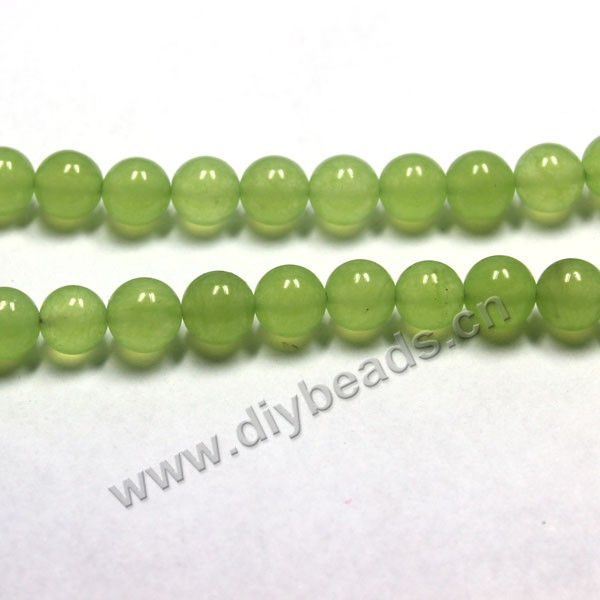 Bead, olive green "jade" (dyed), 10mm round. Sold per 15-inch strand,approximately 37 beads .