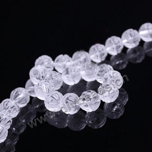 Bead,clear quartz crystal (natural), 12mm round carved lotus flower. Sold per 15-inch strand