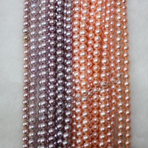 Pearl, cultured freshwater (natural), white/peach/mauve, 6-7mm  round, A+ grade. Sold per pkg of 16-inch strand.