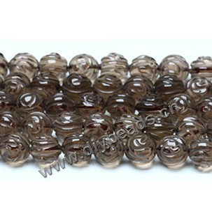 Bead, smoky quartz (heated/irradiated), 10mm carved double side flower. Sold per 16-inch strand.