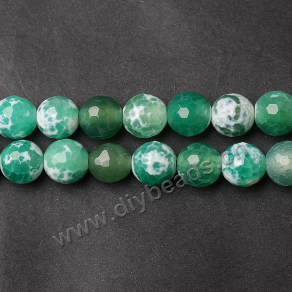 Beads, fire agate, green color, 6mm faceted round. Sold per pkg of 10 strands