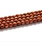Bead, brown goldstone (manmade), 4mm round. Sold per 14.5-inch strand