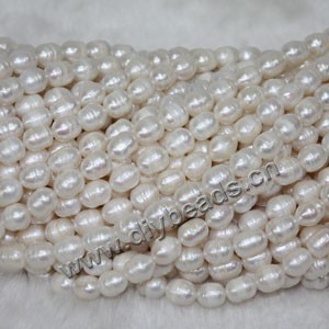 Pearl mix, cultured freshwater pearl (Natural), white / peach / mauve, 8-9mm rice,D grade. Sold per pkg of (36) 15-inch strands.
