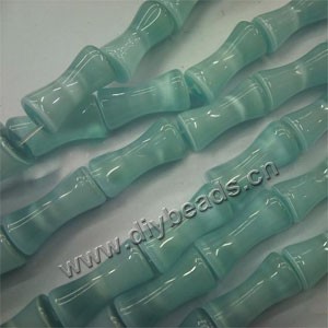 Bead, cat's eye glass, light green,20x10mm bamboo. Sold per 15-inch strand.