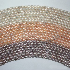 Pearl,cultured freshwater (natural), white/peach/mauve, 5-6mm rice, C grade. Sold per pkg of (25)16-inch strands.