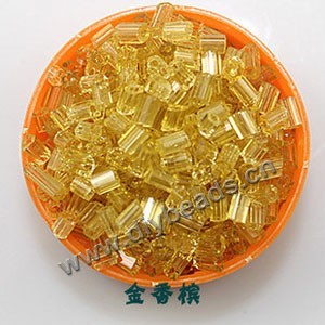 Bugle bead, glass,transparent crystal,beige ,#1(2x2mm) beads. Sold per pkg of 80 grams,approximately 4,500ps.