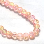 Bead,two tone crackle glass pink and yellow, 8mm round. Sold per 32-inch strand, approximately 100ps/strand