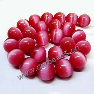 Bead, cat's eye glass,pink, 16mm round, quality grade. Sold per 14.5-inch strand,approximately 25 beads 