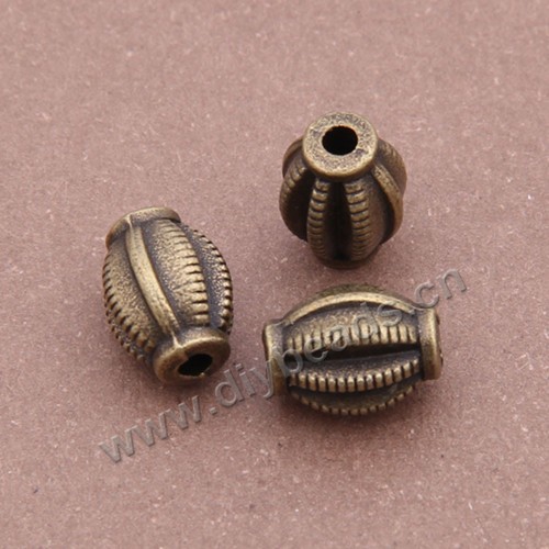 Bead, alloy, 9*7mm drum, antique bronze color, Sold per pkg of 150 pcs.