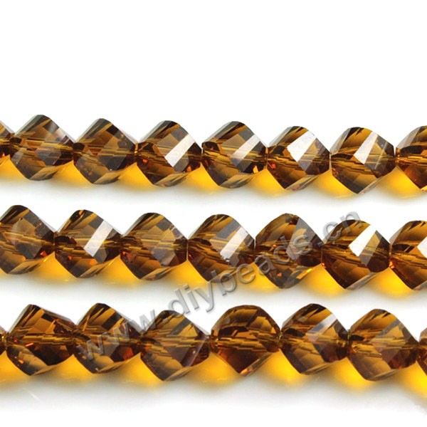 Bead, glass, dark amber color, 10mm faceted twist round, sold per pkg 5 strands.