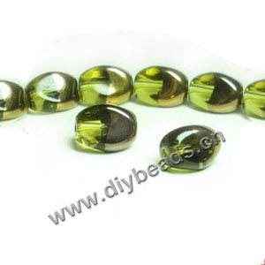 Bead ,copper-plated glass, lime green, 13x10mm twisted oval. Sold per pkg of ten 30cm strand.
