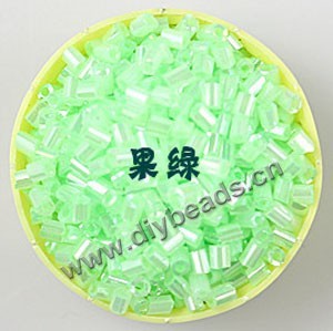 Bugle bead, glass,silky luster,light green,#1 (3x2mm)beads. Sold per pkg of 80 grams,approximately 4,500ps.