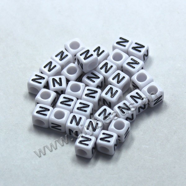 Bead, acrylic,White,alphabet is N, 6x6mm cube with 3.5mm drill hole. Sold per pkg of 100ps