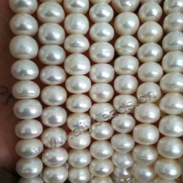 Pearl, cultured freshwater, white,peach, mauve, ,button pearl  ,10-11 mm all light, Sold per bag of one strand