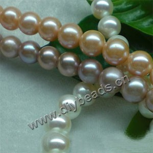 Pearl, cultured freshwater (natural),apricot/satin sand/white, 9-10mm nearly round. Sold per 14.8-inch(37cm) strand