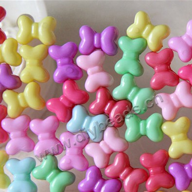 Bead, acrylic, spring color, colorful  15*10mm  christmas bow shape butterfly shape. Sold per pkg of 100 ps.