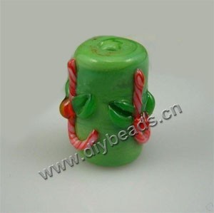 Bead, lampworked glass, opaque green and red, 10x16mm round tube with "candy cane"design. Sold per pkg of 6.