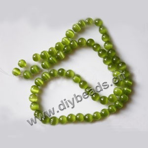 Bead, cat's eye glass,grass green, 6mm round, quality grade. Sold per 14.5-inch strand.