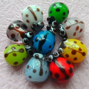 Bead, lampworked glass, multicolored, 15x20x9mm ladybug with eyes. Sold per pkg of approximately 120 beads.