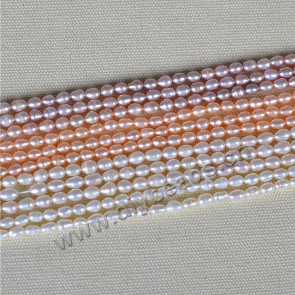 Pearl, cultured freshwater,white pink purple,4.6mm rice, AAA grade. Sold per bag of one strand